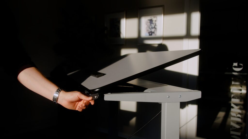 Height adjustable vision table