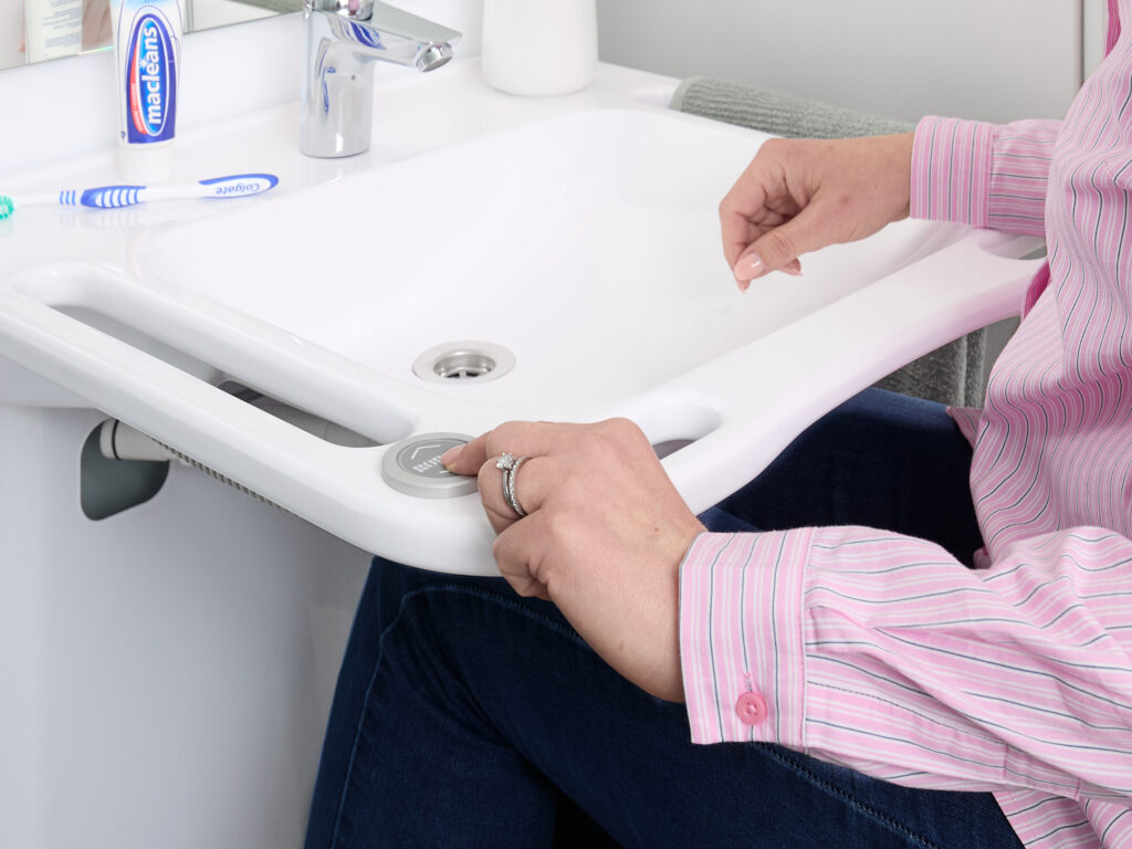Slimline electric height adjustable washbasin